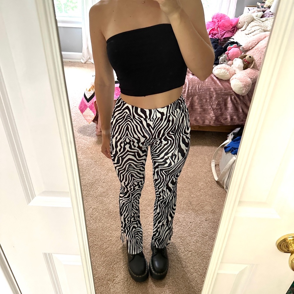 Zebra-striped pants, size XS, worn once, flare slightly at bottom